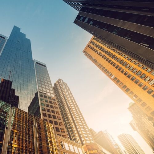 big bildings all around - Escrow and Settlement Services​